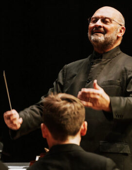 Maestro Lowell Graham conducting.