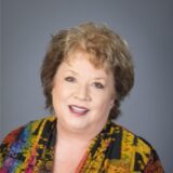 A headshot of Nancy Karlin