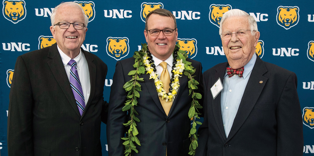 Three generations of UNC president - Richard Bond, Robert Dickeson and Andy Feinstein, standing next to each other for a photo op.