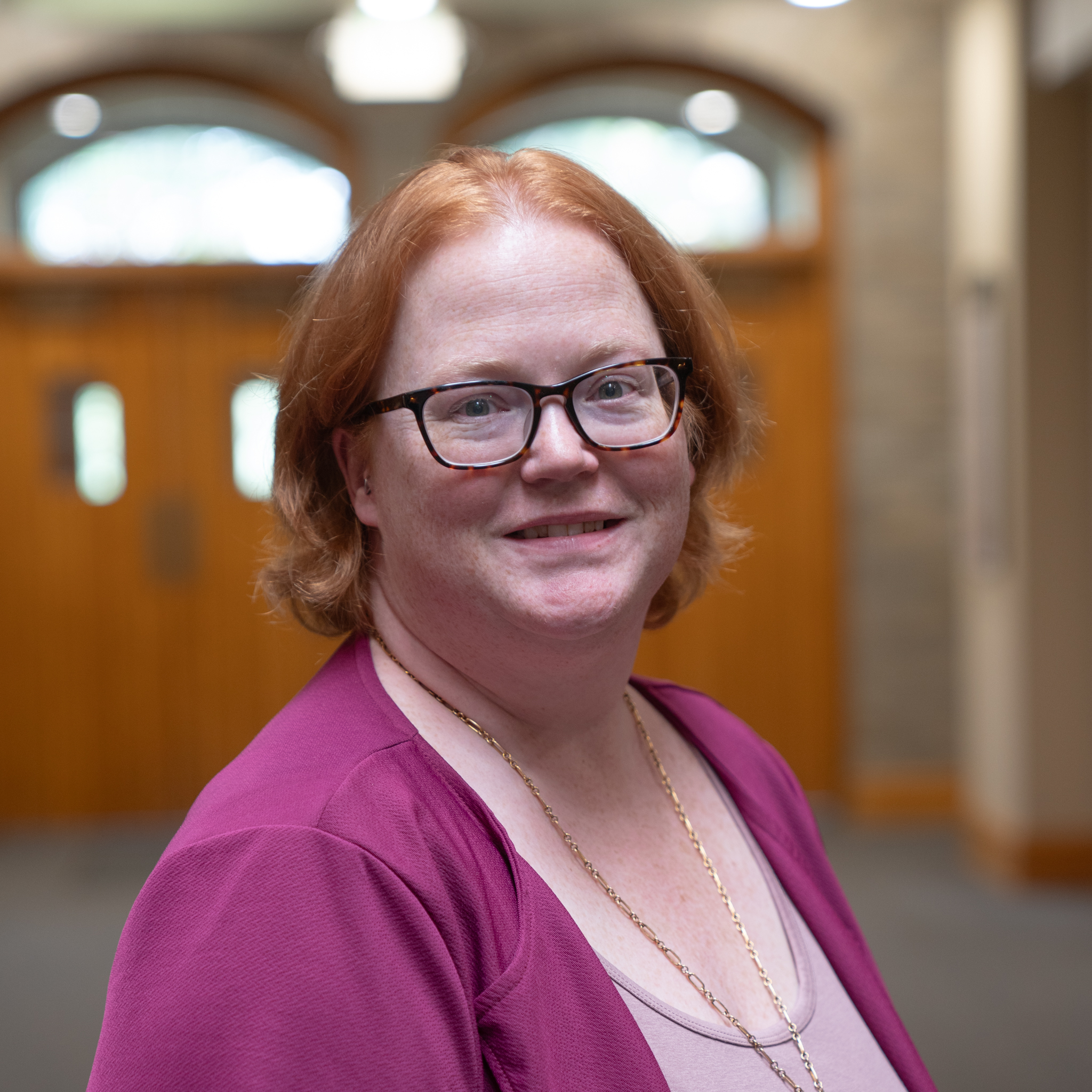 headshot photo of Becca Romine