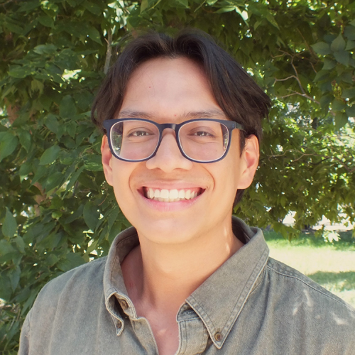 Cesar Rosales Cordova facing front and smiling.