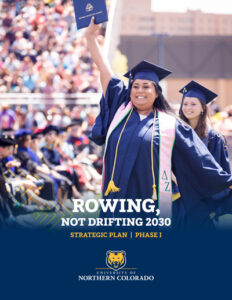 student at graduation with diploma