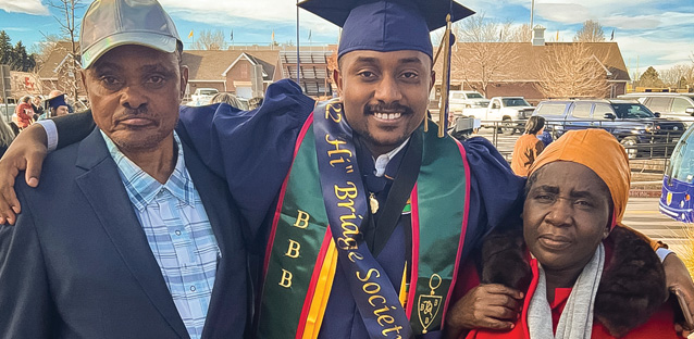 ShaQ graduating from UNC in December 2022 with his parents