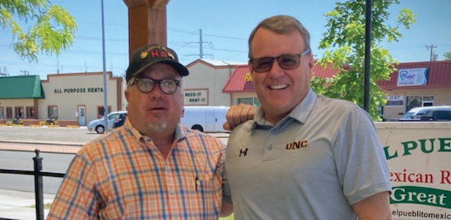 Skylar Houston with UNC President Andy Feinstein