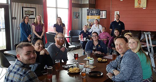 group photo of local school professionals meeting