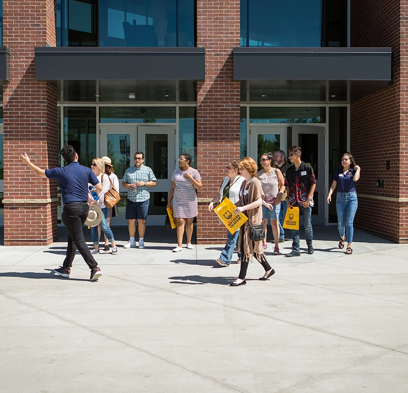Perspective students on a walking tour around campus.