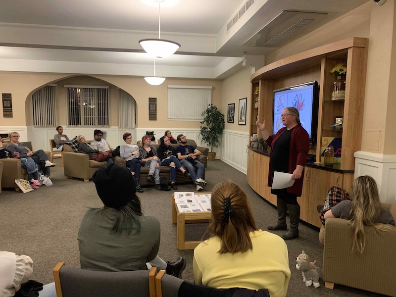 Kristin Bovaird-Abbo First Year Honors Colloquium talking to students