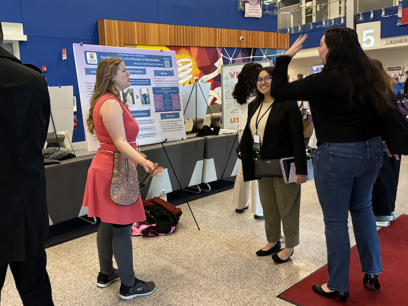 Western Regional Honors Conference, Clare Bolon presenting and talking to other student attendees.