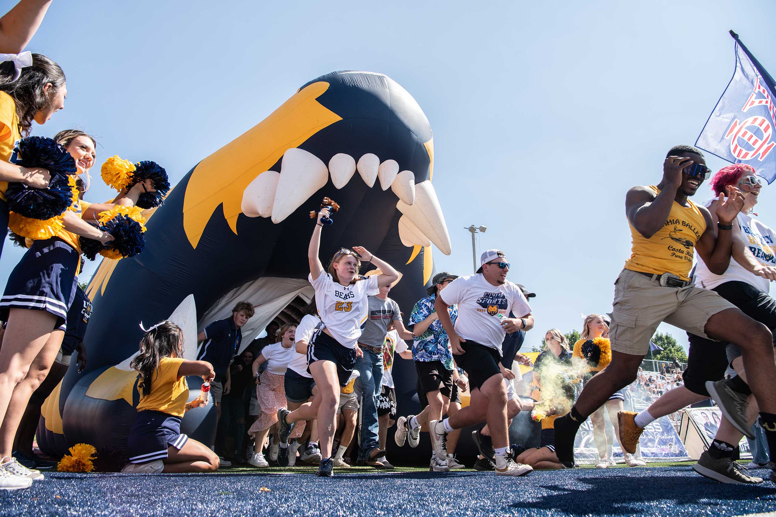 UNC students run out of inflatable bear head.