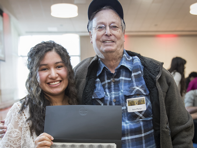 Phelps CAP award winner, Alejandra-Eduardo-Nunez with Mr. Robert Phelps at the Honors Spring Banquet.