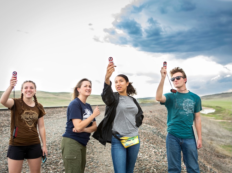 Students chasing storm