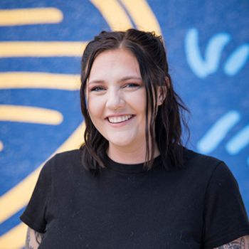 A professional headshot of Mallory Tuhkanen