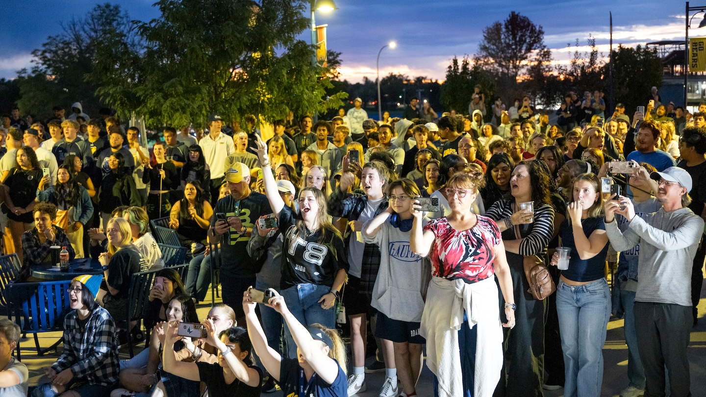 UNC students at Homecoming pep rally at night