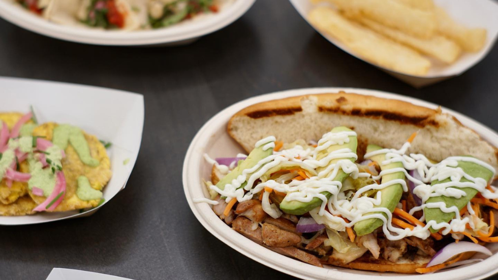 An enticing spread of food sits on a table.