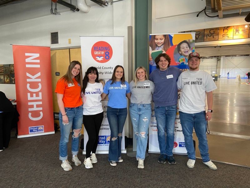 Daniels Scholars take a group photo at an event.