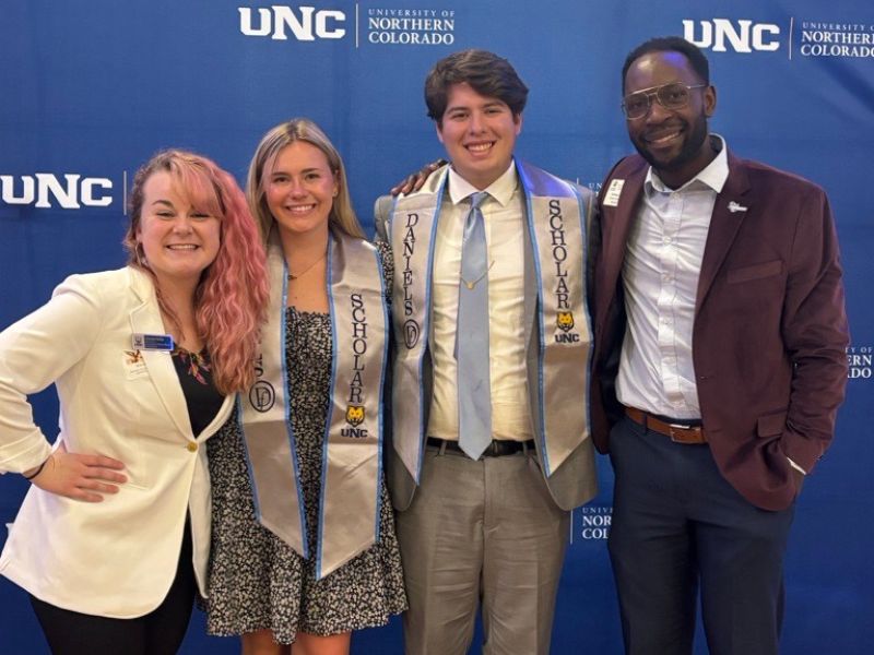 Daniel Scholars pose at an event.