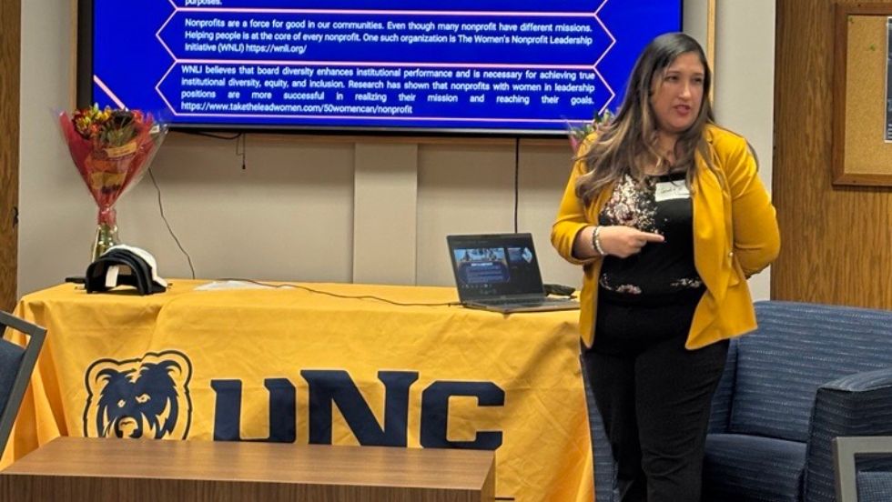 A mentor gives a PLP presentation.