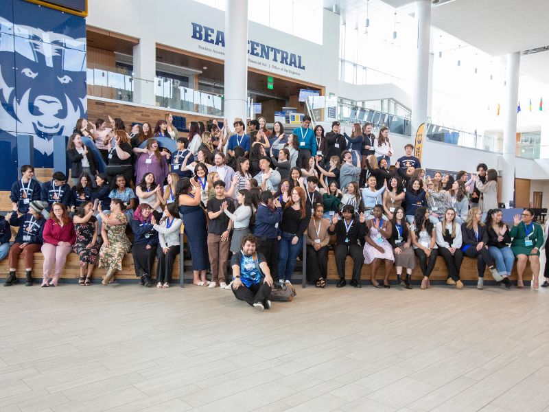 A large group of Reisher scholars pose for a photo.