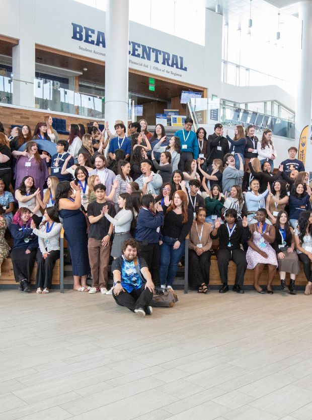 A large group of Reisher scholars pose for a photo.