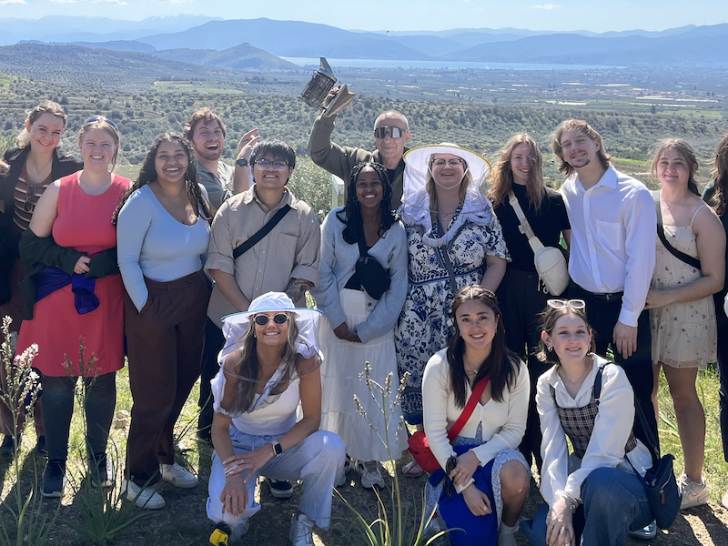 Students on study abroad trip to Greece during HON395 Spring 2025 course, at a visit to a honey farm