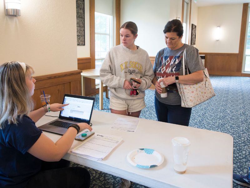 A move-in day check-in table