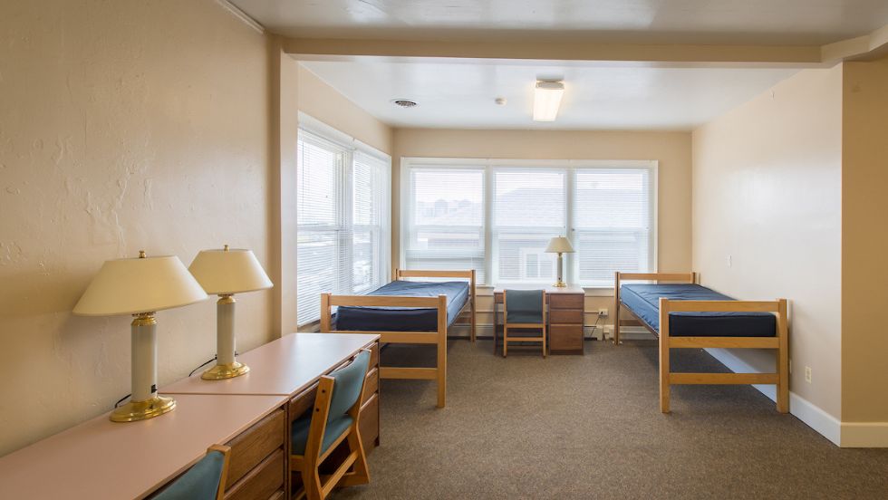 A brightly lit and inviting bedroom