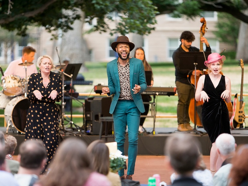 Two women and one man dancing in an outdoor production by Little Theatre of the Rockies