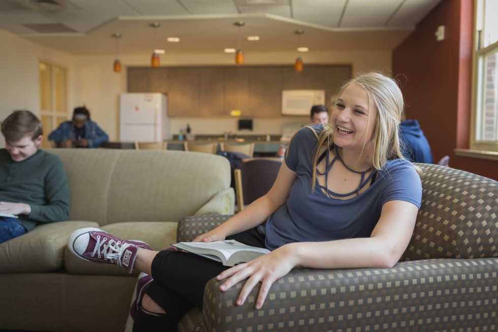 Student Laughing in lounge