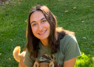 Photo of Emily Garcia with a dog