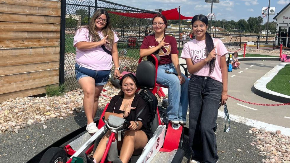 Members of KDChi pose for a photo at a go-cart event