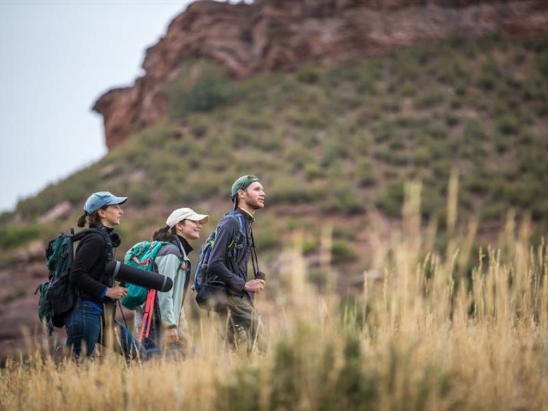Students hiking in the fall