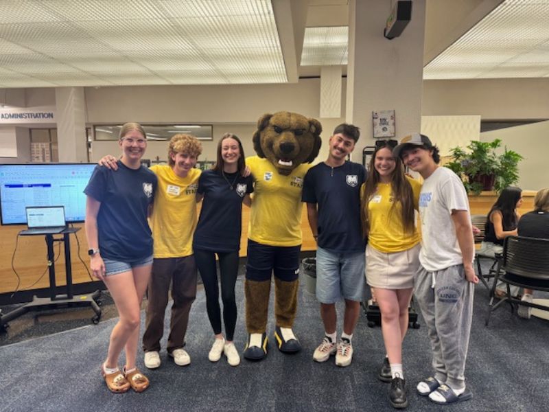 UPC staff poses for a group photo with Klawz