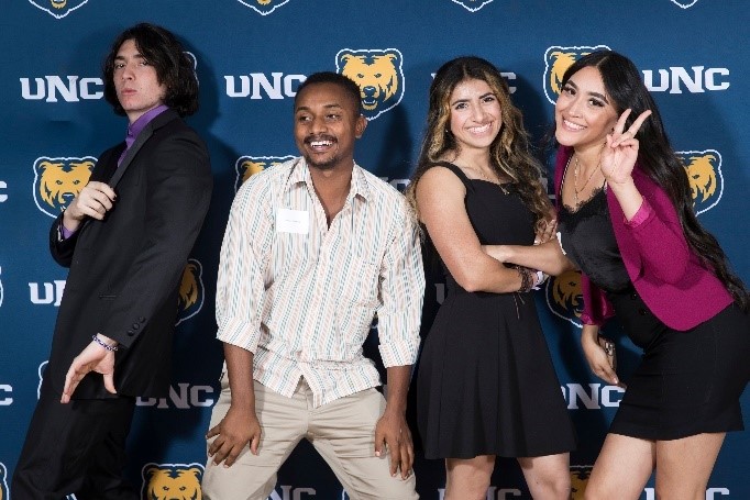 Four students hamming it up for the camera