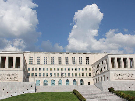 A white building with columns.