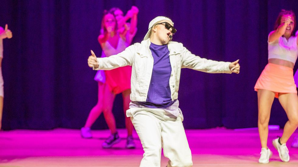 A student performs at Bear Sync which is hosted by UPC