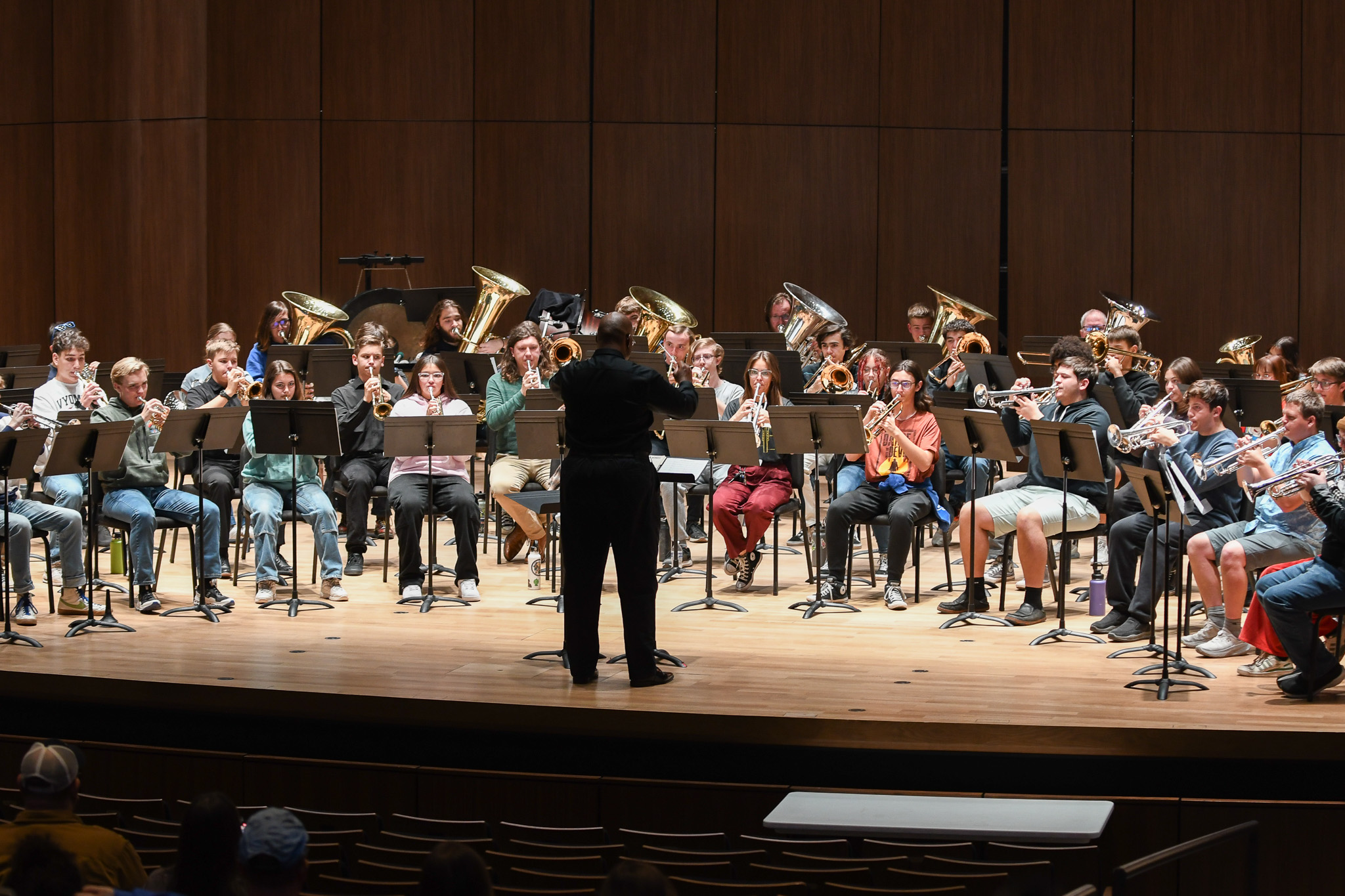 A group of brass players on stage at UNC Brass and Percussion Day.