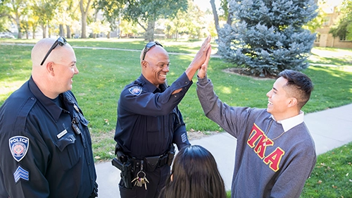 UNC students interacting positively with campus police.