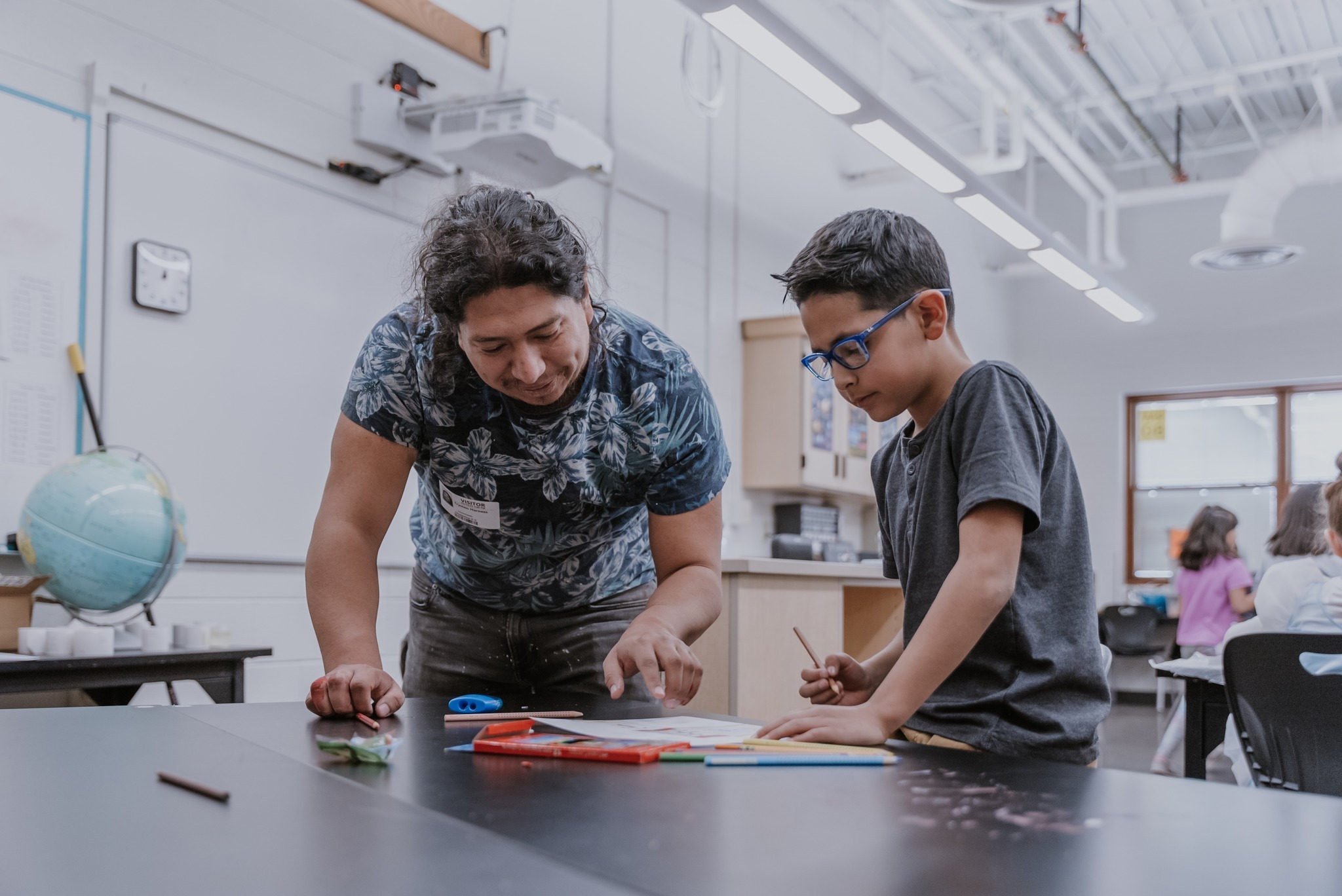 Student teacher working with a young student at Chappelow Arts Magnet School.
