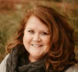 A portrait of Angie O'bleness