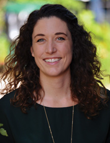 A headshot of Grace Franklin smiling outside