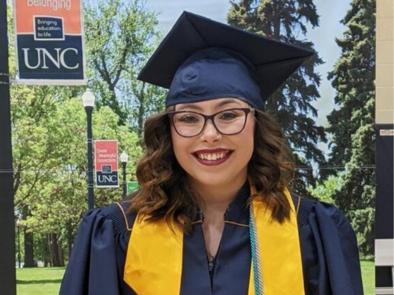 Cumbres alumni in cap and gown