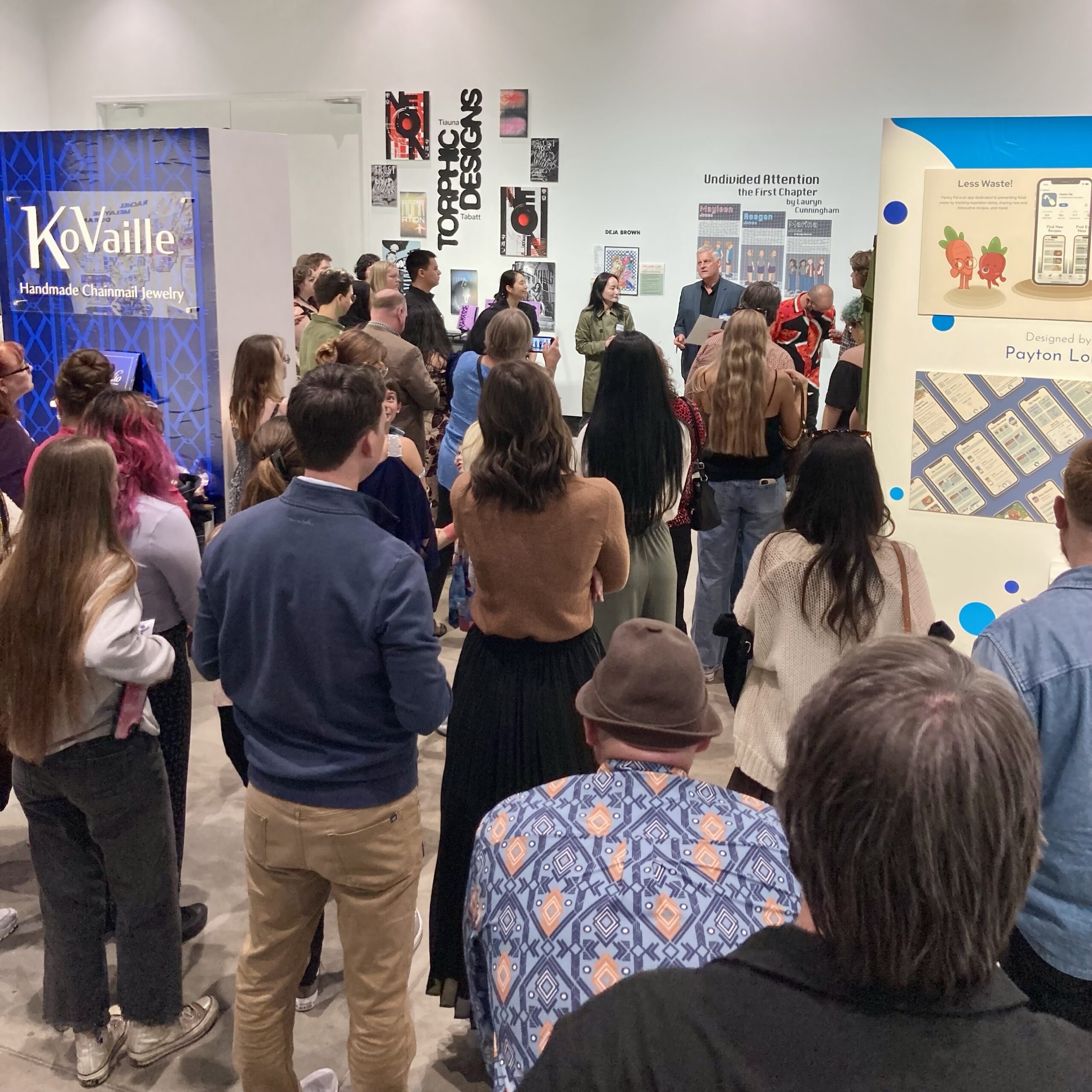 Attendees at the Graphic Design Senior Show.