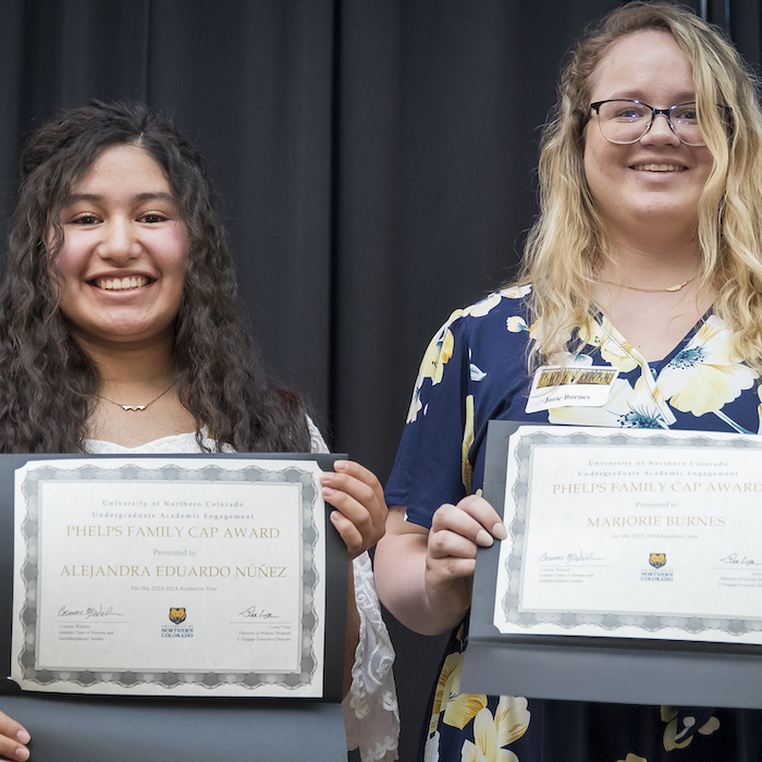 two Phelps CAP Award recipients holding certificates