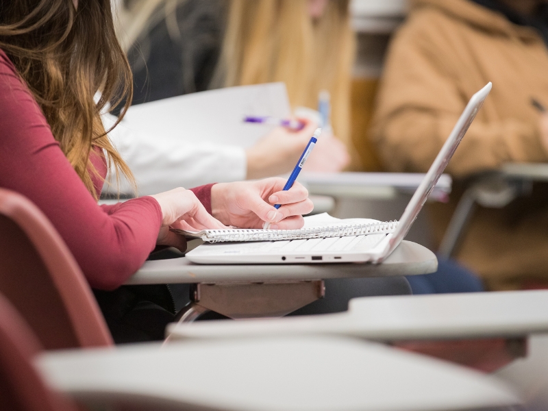 A student working on an assignment in the classroom