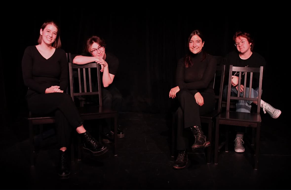 A group of 4 Theatre Studies students sitting on chairs.