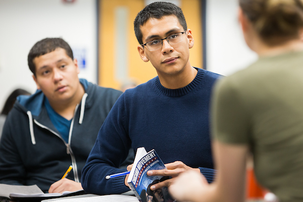 Three students in a Chicana/o and Latinx class