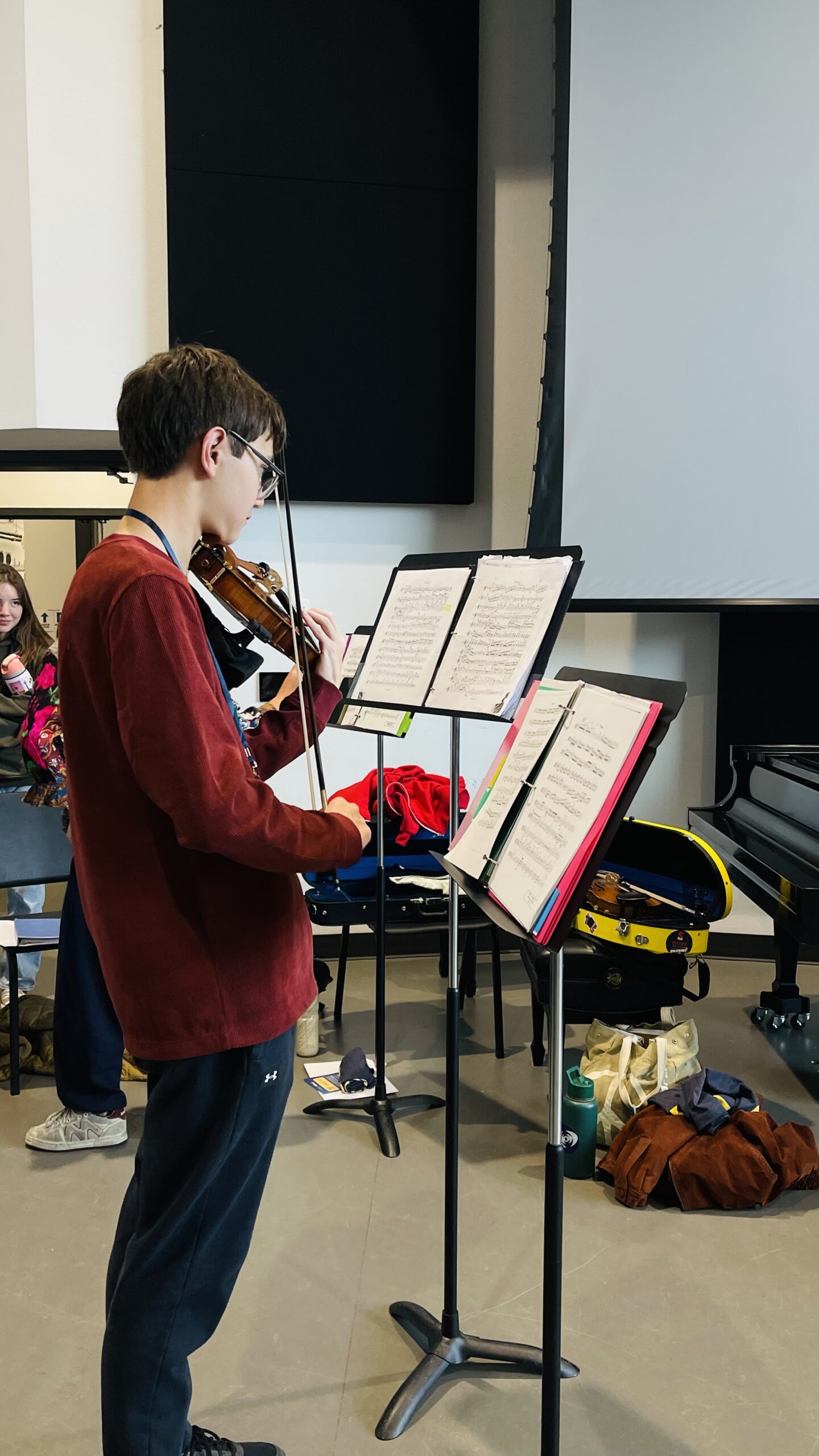 Student playing violin at the Western States Honor Orchestra Festival.