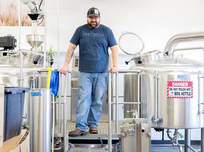 Man in UNC Brewing Laboratory with equipment