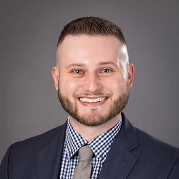 Alt text: Tanner Robinson, Work-Based Learning and Fairs Coordinator