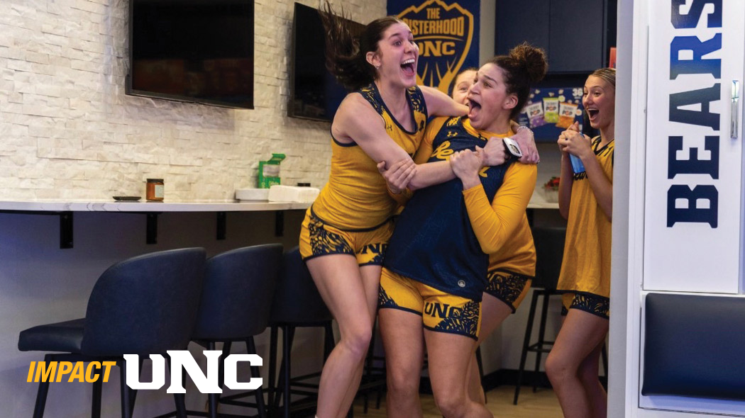 Four UNC Women's Basketball players react with excitement to their new locker room